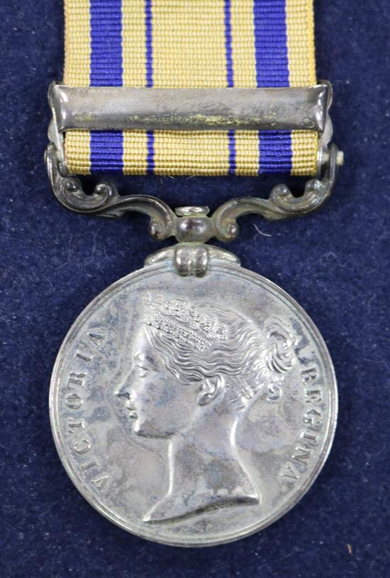 A Victorian South Africa medal with 1879 clasp, A QEII Africa medal with Kenya clasp named T Whitelow,